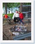 IMG_6200 * Karl and Ulrika and the homemade BBQ we used at the cabin * 899 x 1199 * (175KB)
